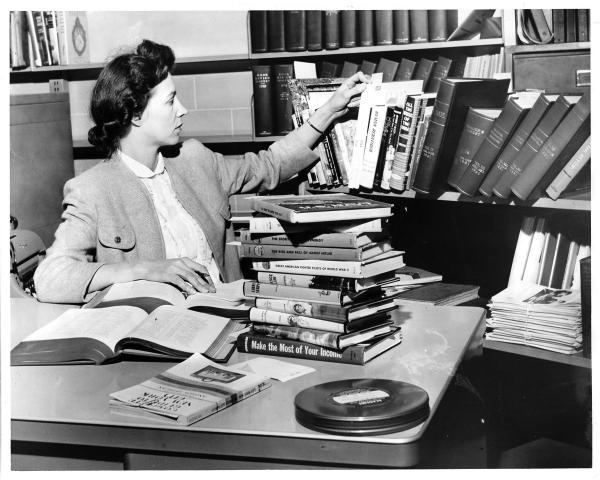 Bellaire Public Library Director Lois Walker at her desk, 1961